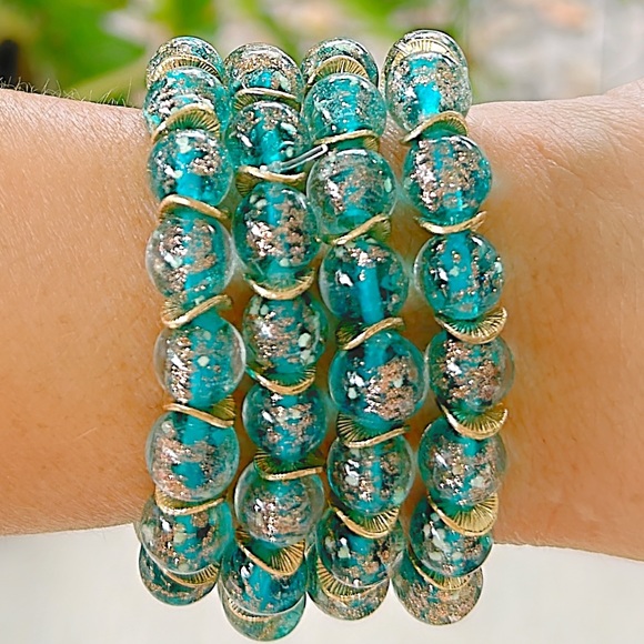 Lake blue firefly 8mm glass beaded bracelet with gold filled wavy spacer beads - Picture 4 of 4